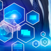 A businessman's hand touching IT icons on a blue background, symbolizing interaction and engagement.